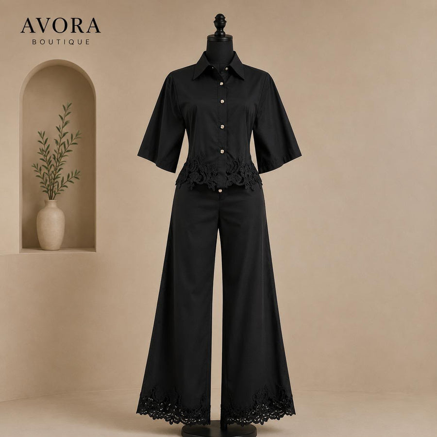 Conjunto negro de blusa y pantalón con guipur